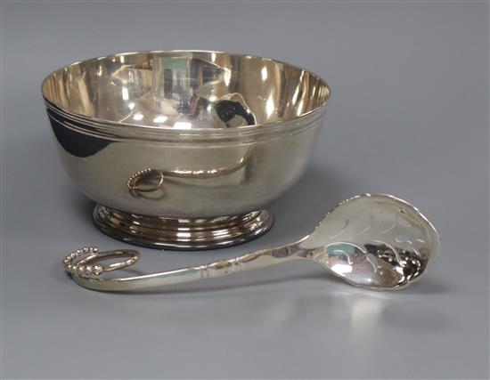 A George VI silver sugar bowl, London 1945 and a 1920s George Jensen sterling sifter spoon.